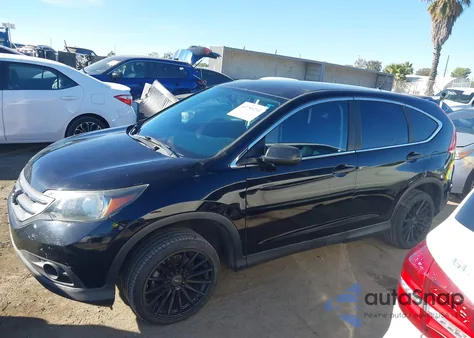 2014 Honda Cr-V Lx z USA, uszkodzony, nr VIN 2HKRM3H31EH523534